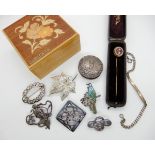 A silver paua shell bird brooch, Celtic style silver brooches, a micro mosaic pin in original box, a