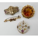 A 9ct gold brooch set with a glass cairngorm, diameter 3cm, a 9ct pendant brooch set with a pink