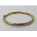 A 9ct gold twist pattern bangle, weight 15.3gms Condition Report: Available upon request