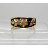 A 15ct gold pearl and black enamel mourning ring (some pearls missing) dated Birmingham 1887, size