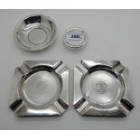 A lot comprising a pair of silver ashtrays, Birmingham 1962, 10.5cm square, bearing a coat of