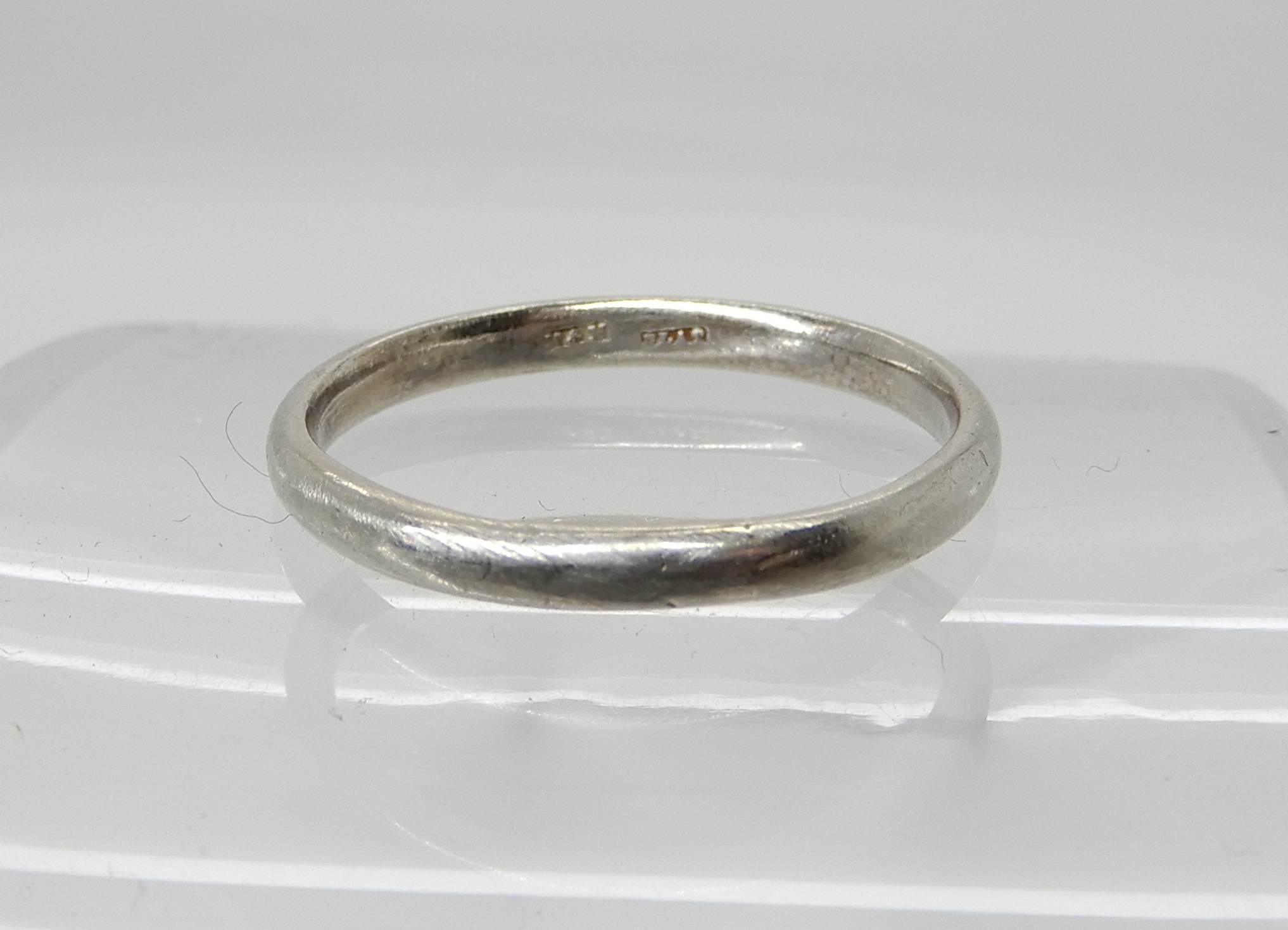 A platinum wedding band size P, weight 3.3gms Condition Report: Available upon request