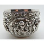A Burmese white metal bowl with embossed decoration, 8cm high x 11cm diameter, 298gms Condition
