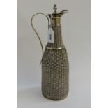 A white metal mesh overlaid claret jug Condition Report: Available upon request