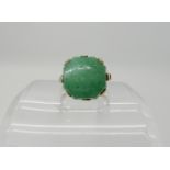 A bright yellow ring set with an octagonal cut aventurine, size P, weight 5.2gms Condition Report: