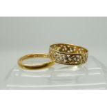 A 22ct gold wedding ring size M1/2, weight 3.2gms, together with a 14k wedding ring size R1/2,