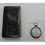 A lot comprising a lady's silver fob watch and a silver mounted animal skin purse (2) Condition