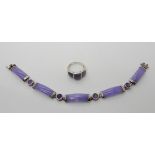 A silver mount lilac hardstone bracelet with Chinese symbols and a similar ring Condition Report: