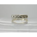 An 18ct gold six stone diamond ring set with estimated approx 0.60cts of brilliant cut diamonds