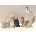 A Lladro figure of a cockerel, a D & G model of a parrot and a Rosenthal pot and cover decorated
