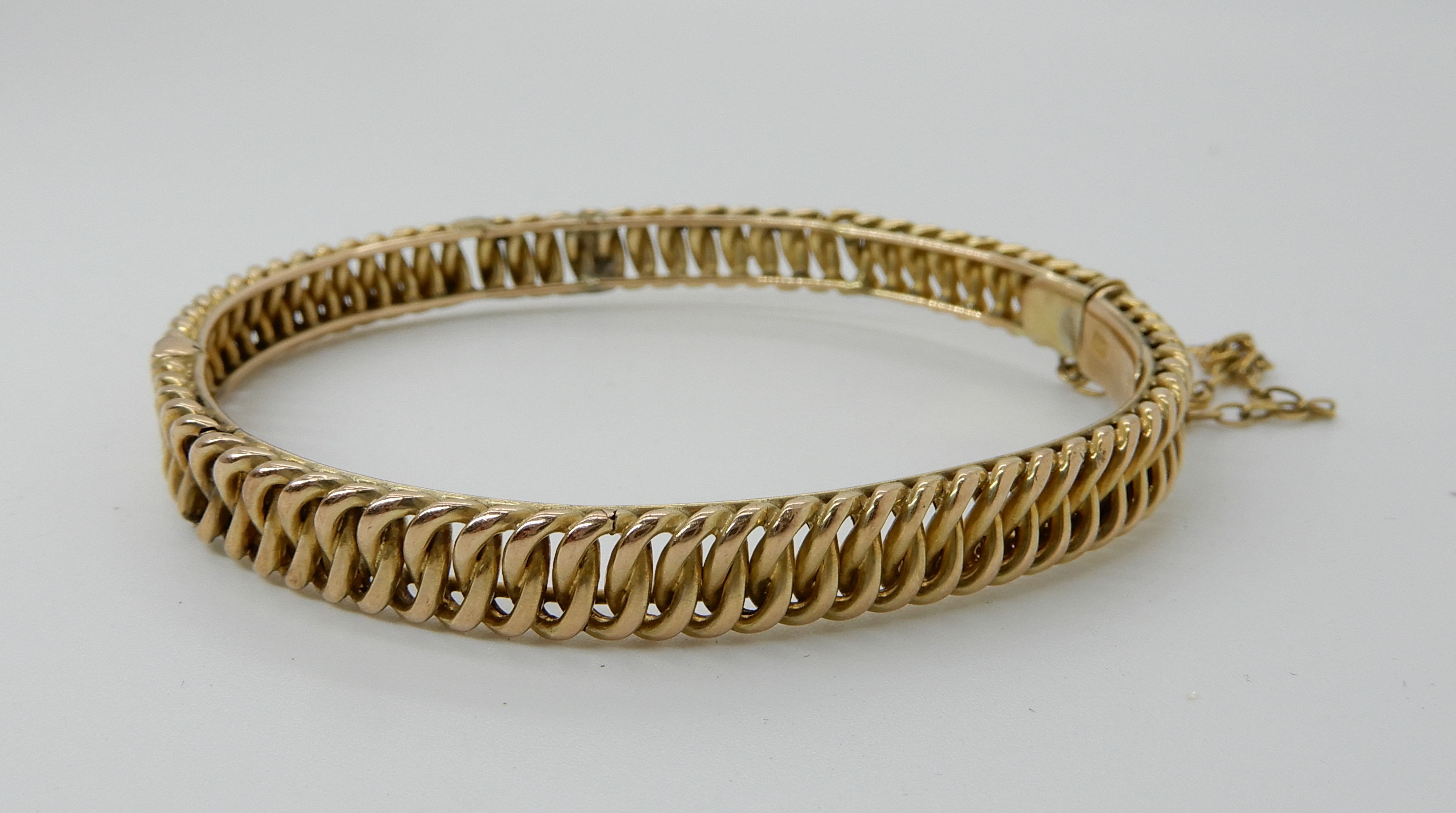 A 9ct link pattern bangle (af) weight 10.5gms Condition Report: Available upon request