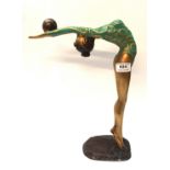 A contemporary metal sculpture of a gymnast, 35cm high Condition Report: Available upon request