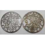 A pair of silver overlaid teapot stands, Birmingham 1935, the overlay spelling "G1935M" (one def),