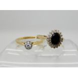 An 18ct gold and platinum diamond solitaire in illusion setting, size O, weight 2.5gms and a 9ct