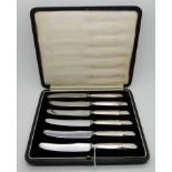 A cased set of six silver handled butter knives, Sheffield 1941 Condition Report: Available upon