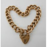 A 15ct gold curb link bracelet with heart shaped clasp length approx 18cm, weight 17.1gms