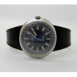 A retro Omega Geneve Dynamic wristwatch, with blue racing dial with black leather strap Condition