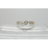 An 18ct white gold diamond solitaire ring set with an estimated approx 0.20ct brilliant cut diamond,