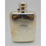 A silver spirit flask, Sheffield marks, of rectangular shape monogrammed "JLB" and dated 4-10-64,