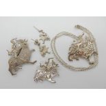 A collection of silver Maeshowe dragon pattern jewellery to include, By Ola Gorie a pendant and