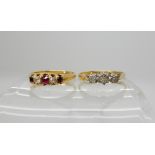A bright yellow metal red gem and diamond ring size M and an 18ct gold three illusion set diamond