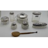 A lot comprising six various silver topped dressing table, jars, pin dish etc and a bone spoon (7)
