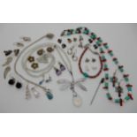 A large costume jewellery dragonfly pendant, silver gem set earrings etc Condition Report: Not