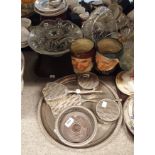 A Deco style silver plated dressing table set, circular salver, two Royal Doulton character jugs,