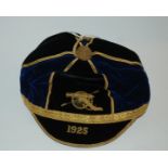 A blue military cap, 1925 with J.G. Plumb & Co label inscribed in ink J.C. Hardy esq Condition