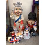 Assorted novelty gnome figures including the Queen and corgi etc Condition Report: Available upon