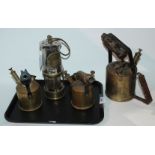 A miners lamp and three various blow torches Condition Report: Available upon request