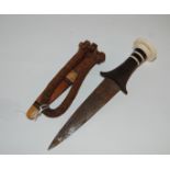 A Sudanese arm dagger in scabbard Condition Report: Available upon request