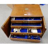 A part set of silver plated cutlery in oak canteen (57), with some unassociated cutlery Condition