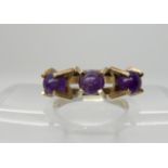 A 9ct gold retro amethyst ball ring by Finnish designer Kupittaan Kulta, size P1/2, weight 3.6gms