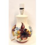A Moorcroft frilled orchid pattern table lamp Condition Report: Crazed all over.
