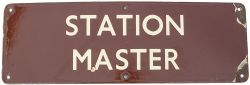 BR(W) enamel doorplate STATION MASTER measuring 18in x 6in. In good condition with a small amount of