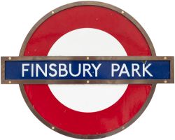 London Underground enamel target/bullseye sign FINSBURY PARK in original bronze frame. Measures 24in