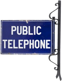 Enamel sign PUBLIC TELEPHONE with original steel wall mounting bracket. Both sides in very good