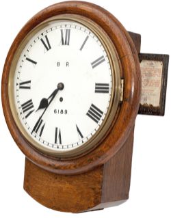 North Eastern Railway 12in oak cased drop dial railway clock with a chain driven fusee movement.