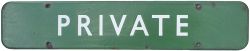 BR(S) FF dark green enamel doorplate PRIVATE measuring 18in x 3.5in. In good condition with a few