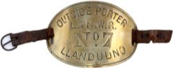 LNWR brass armband hand engraved OUTSIDE PORTER L&N.W.R. No7 LLANDUDNO. In very good condition