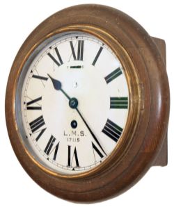 LMS 8 inch oak cased railway clock with original dial lettered L.M.S. 17115 and a Smiths Empire