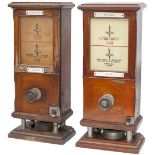 A pair of LNWR mahogany cased Absolute Block Instruments complete with bells. Both are stamped in