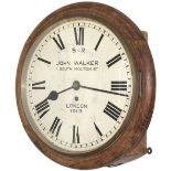 Southern Railway 12 inch oak cased fusee dial clock with wire driven movement. The original dial