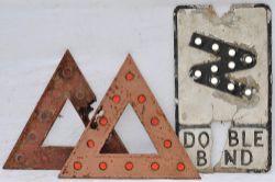 A lot containing 2 x damaged road sign triangle tops together with a damaged DOUBLE BEND road sign