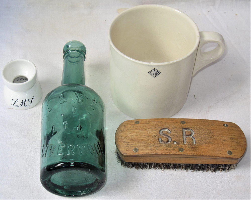 A lot containing 4 items. An L&YRCo beer bottle embossed L&YR LIVERPOOL. A GWR art deco china tea