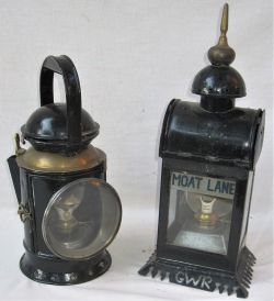 2 x Railway Lamps. An unmarked GWR brass collar hand lamp together with a modified porters lamp