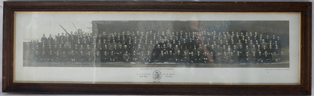 LSWR official glazed and framed photograph of NINE ELMS Railway Staff dated 1922.