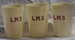 3 x LMS ivorine drinking beakers. All three marked LMS.