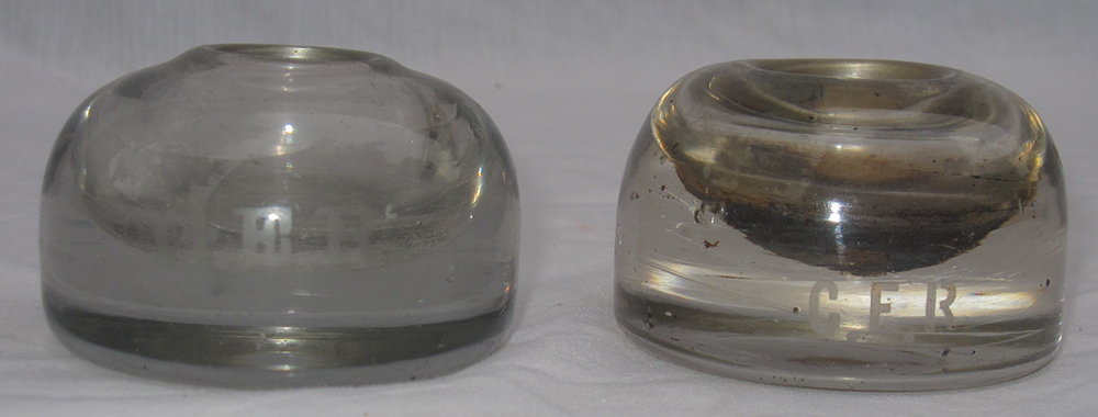 2 x GER glass Ink wells marked on front GER in good condition.